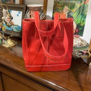 Coach handbag with middle zipper